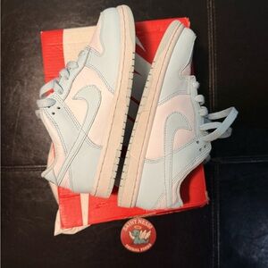 Nike Dunk Low sneakers in the "Barely Green" or "Glacier Blue" colorway size 2y